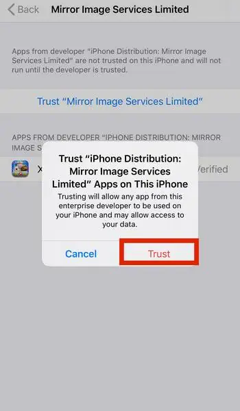 Kotak konfirmasi untuk mempercayai aplikasi Mirror Image Services Limited, dengan Trust disorot merah